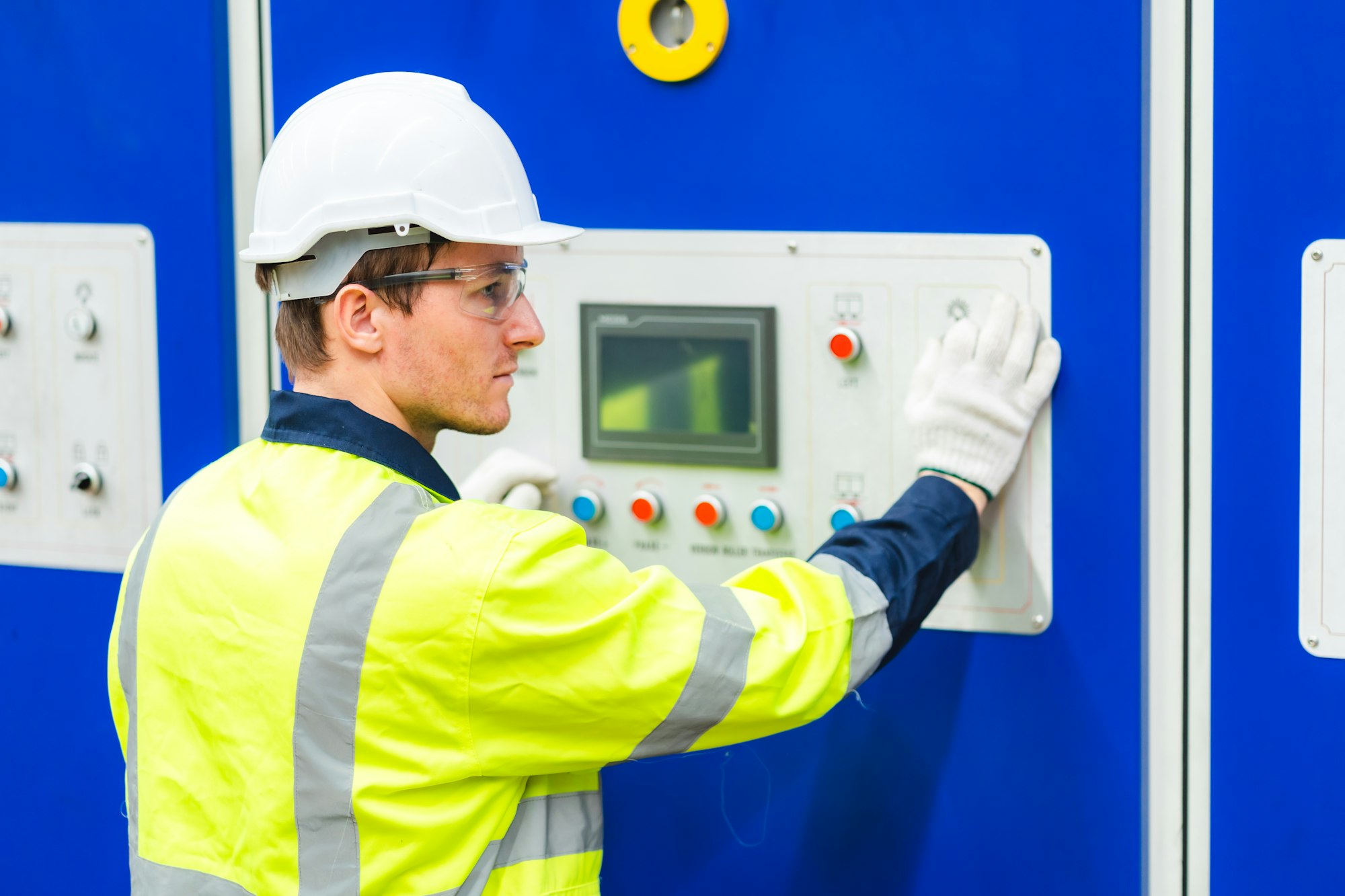 Electrical engineer inspection control panel and commissioning during pressure steam drum